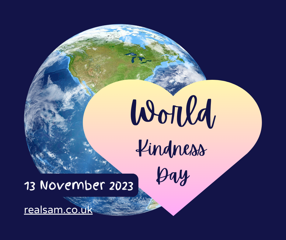 ‘World Kindness Day’ written in bold cursive on a gradient light yellow and pink heart. The background is dark navy blue. On the left behind the heart is Earth. On the lower left it says, ’13 November 2023’ and the link realsam.co.uk.