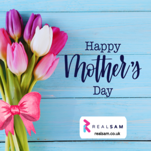 On the left, bright purple, pink, and white tulips gathered in a small bouquet with a pink bow. To the right it says, “Happy Mother’s Day.” On the bottom is the RealSAM logo and website at realsam.co.uk.