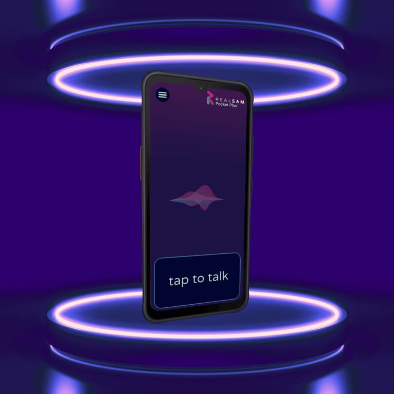 RealSAM Pocket Plus Mobile phone on a stage illluminated by purple lights