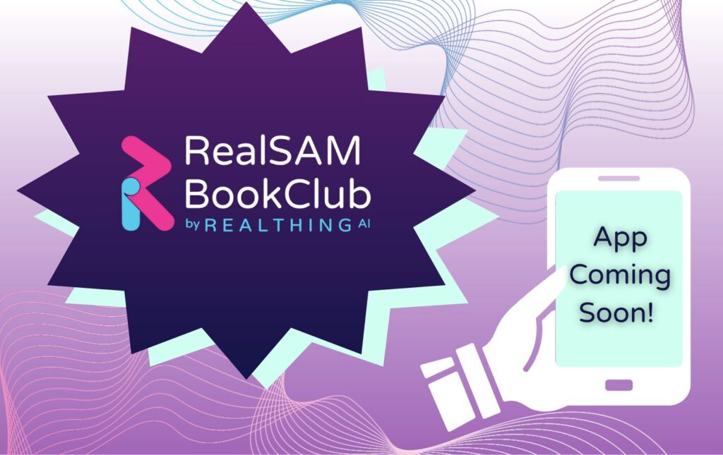 The ‘RealSAM BookClub by RealThing Ai’ logo is displayed in a large star, filled with a purple— navy blue gradient background, located slightly above centre and taking up most of the frame. Slightly below the logo is a white graphic of a hand holding a phone, the phone screen is mint green, on it the words ‘App Coming Soon!’ are written, indicating that a RealSAM BookClub App is coming soon. The background of the image is a purple to white gradient, with intricate, interweaving blue and pink lines lacing across it.